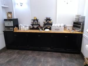 Kuchyň nebo kuchyňský kout v ubytování AACR Hotel Monteolivos