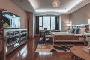 Posezení v ubytování Tianjin G'apartment - Five Great Avenues