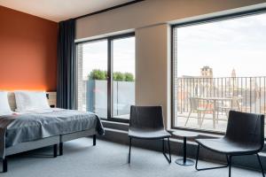 Postel nebo postele na pokoji v ubytování Citybox Antwerp