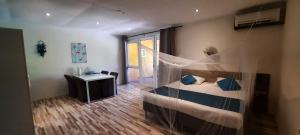 Postel nebo postele na pokoji v ubytování B&B Casa Trankilo