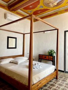 Posteľ alebo postele v izbe v ubytovaní Corallini Luxury Apartments - Bokè Apartment