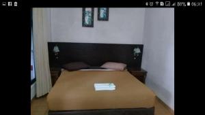 Voodi või voodid majutusasutuse RF Hotel toas
