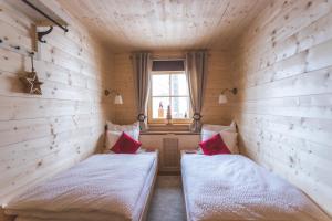 Posteľ alebo postele v izbe v ubytovaní Hilltop Appartement