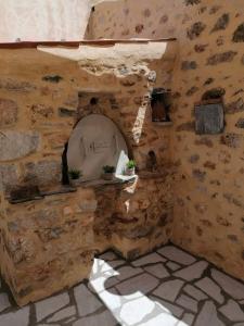 a model of a kitchen in a wooden building at Rodomelo Cute Studio 2 in Leonidion