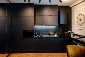 Kuchnia lub aneks kuchenny w obiekcie Apartamenty Stare Miasto Zamość, Prywatny Parking, Winda
