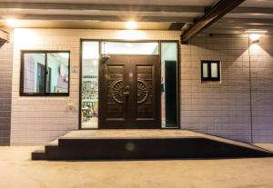Fasaden eller entrén till 小田時光溜滑梯親子民宿