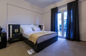 Posteľ alebo postele v izbe v ubytovaní Pearl Bay Hotel Apartments