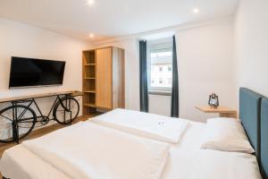 Postel nebo postele na pokoji v ubytování Hotel Knorz