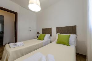 A bed or beds in a room at Villa la Tonnara CaseSicule, Private Villa far 50 m from the Sand Beach