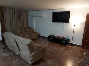 Posezení v ubytování Condado San Juan Prime location 5minsWalk To Beach