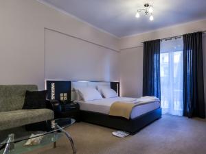 Posteľ alebo postele v izbe v ubytovaní Pearl Bay Hotel Apartments
