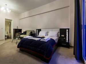 Posteľ alebo postele v izbe v ubytovaní Pearl Bay Hotel Apartments