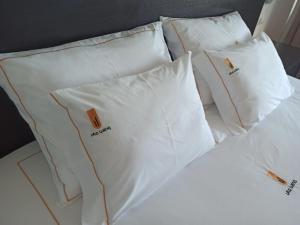 Ein Bett oder Betten in einem Zimmer der Unterkunft Hotel Vila Luena