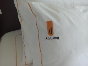 Ein Bett oder Betten in einem Zimmer der Unterkunft Hotel Vila Luena
