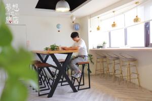 A restaurant or other place to eat at Dream 12 Hotel