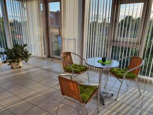 Rõdu või terrass majutusasutuses Gästehaus Aurelia