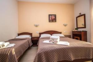 Posteľ alebo postele v izbe v ubytovaní Denis Studios and Apartments