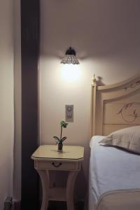 Postel nebo postele na pokoji v ubytování Hotel Doltso