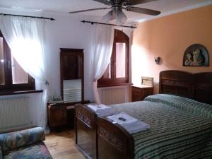 Кровать или кровати в номере Aurora B&B