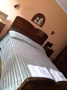 Łóżko lub łóżka w pokoju w obiekcie Aurora B&B