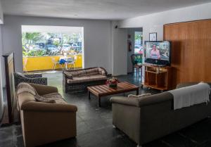 A seating area at Hotel Atlantico Sul