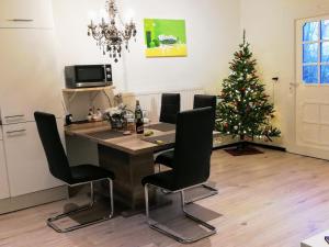 TV a/nebo společenská místnost v ubytování Ferienwohnung Einbeck FeWo B Nolte