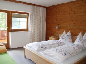 Posteľ alebo postele v izbe v ubytovaní Ferienwohnung Frauenhoffer