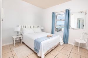 Кровать или кровати в номере La Palma Villas 35