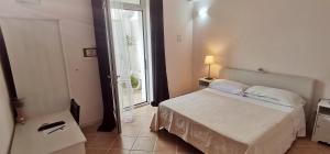 Postel nebo postele na pokoji v ubytování B&B Marebello