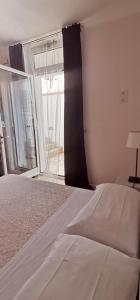 Postel nebo postele na pokoji v ubytování B&B Marebello