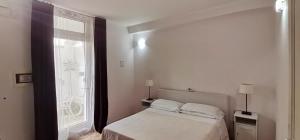 Postel nebo postele na pokoji v ubytování B&B Marebello