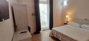 Postel nebo postele na pokoji v ubytování B&B Marebello