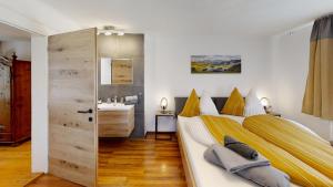 Posteľ alebo postele v izbe v ubytovaní Chalet Auszeit