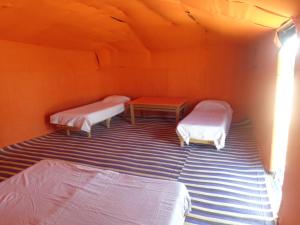 Postel nebo postele na pokoji v ubytování Camel Trek Bivouac