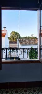a view from a window of a balcony at LA CASITA DE MOSTO in El Pedroso