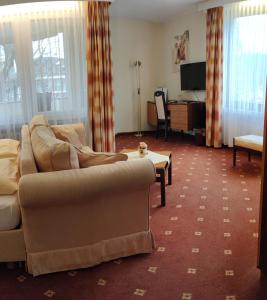 TV a/nebo společenská místnost v ubytování Bad Pyrmonter Hof + 3 fotografie
