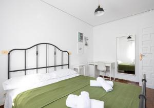 Postel nebo postele na pokoji v ubytování La casa de la Playa. Piscina, Wifi y Terraza.