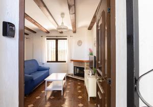 Posezení v ubytování La casa de la Playa. Piscina, Wifi y Terraza.