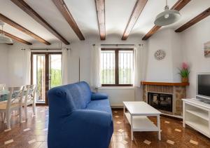 Posezení v ubytování La casa de la Playa. Piscina, Wifi y Terraza.