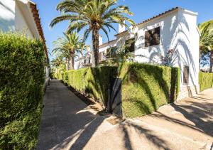 Zahrada ubytování La casa de la Playa. Piscina, Wifi y Terraza.