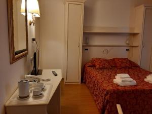 Cama o camas de una habitación en Hotel Vedute