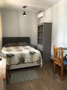 Postel nebo postele na pokoji v ubytování Studio Container Bombinhas