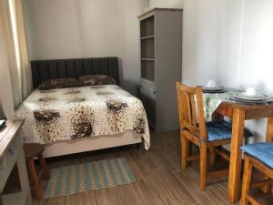 Postel nebo postele na pokoji v ubytování Studio Container Bombinhas