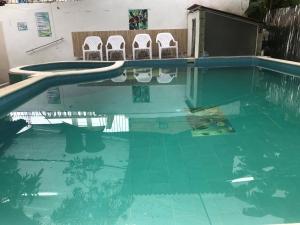 Πισίνα στο ή κοντά στο Cabaña La Fortaleza +20 φωτογραφίες