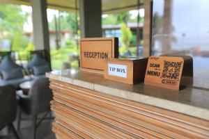 two boxes sitting on top of a counter at AKIRA Lipe Resort in Ko Lipe