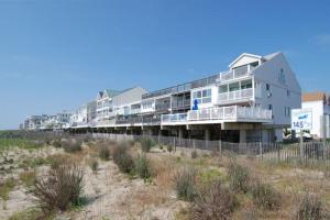 a row of apartment buildings on the beach at White Sands Village 22 in Ocean City