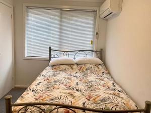 Ein Bett oder Betten in einem Zimmer der Unterkunft Gale Street Retreat Busselton