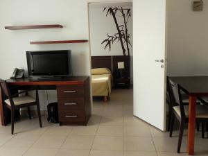 TV a/nebo společenská místnost v ubytování Residence Services Calypso Calanques Plage