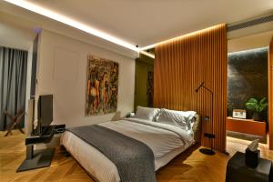 Postel nebo postele na pokoji v ubytování Athens Dom Hotel