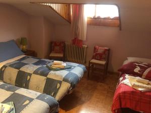 מיטה או מיטות בחדר ב-Casa Soia